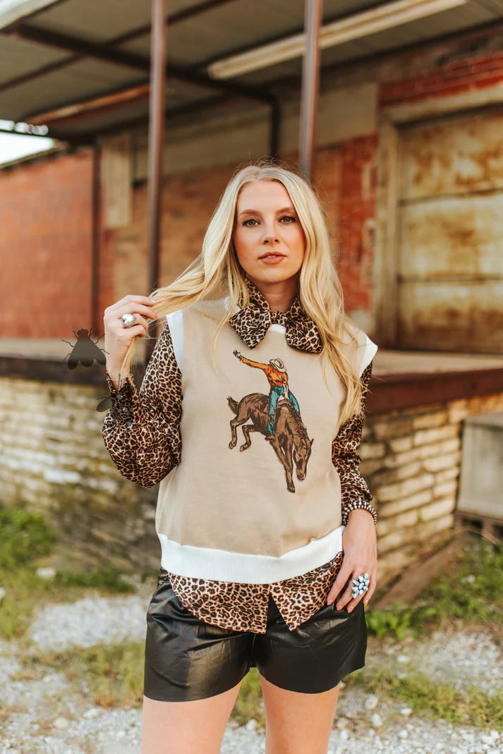 A MILLION BUCKS SWEATER VEST