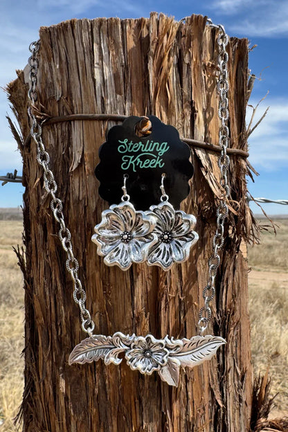 TOOLED FLOWER DANGLE EARRINGS